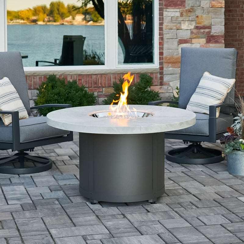 The Outdoor GreatRoom Company Beacon 48" White Onyx Round Gas Fire Pit Table with Crystal Fire® Plus Burner